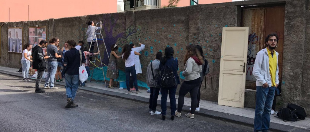 Murale di Diala Brisly con gli studenti del liceo Basile - Messina